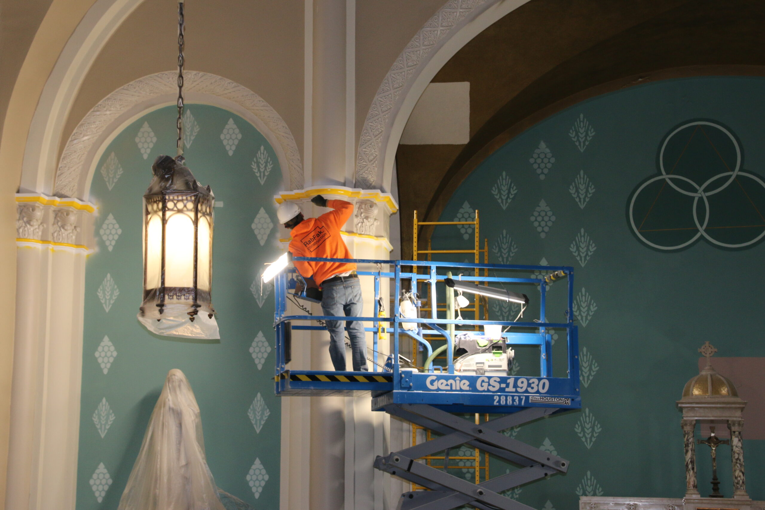 Painters work in Duchesne Academy's chapel